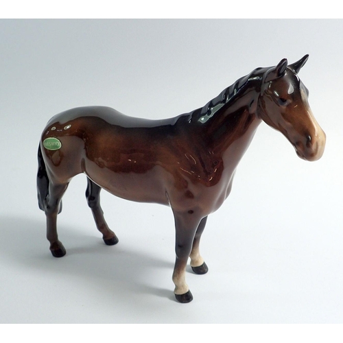 42 - A Beswick brown horse, 17.5cm tall, hairline to chin