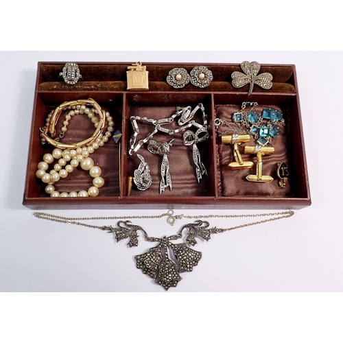 424 - A group of silver and marcasite jewellery including ring, brooches, earrings, plus costume jewellery