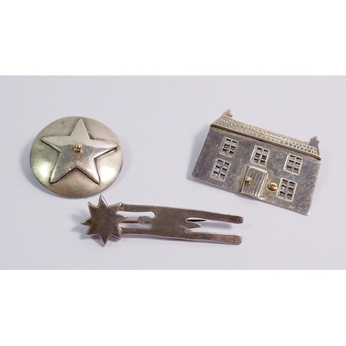 426 - Three silver brooches including star one by Elizabeth Mary Cooke