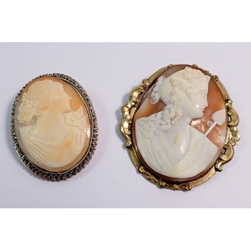 430 - A Victorian pinchbeck mounted cameo brooch carved woman with vines to her hair, 5.7 x 5cm and a whit... 