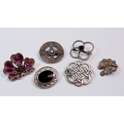 435 - Six various silver brooches including Celtic, shell and enamel