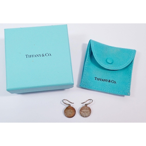 438 - A pair of Tiffany silver disc earring 'Please Return to Tiffany', boxed with pouch