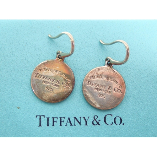 438 - A pair of Tiffany silver disc earring 'Please Return to Tiffany', boxed with pouch