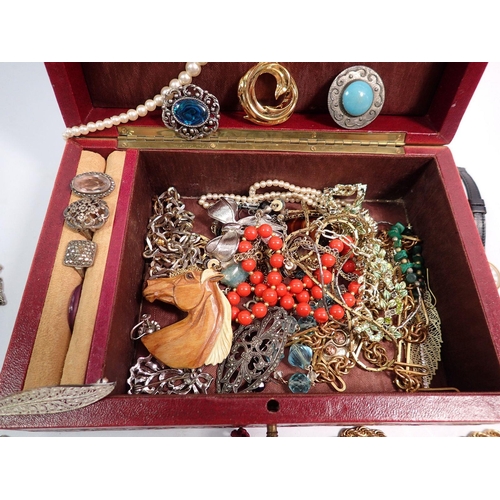 452 - A leather box of costume jewellery