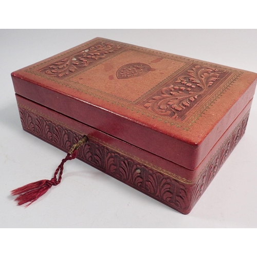 452 - A leather box of costume jewellery