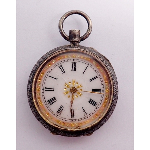 466 - A 19th century continental 935 silver fob watch with floral enamel inlaid decoration to back