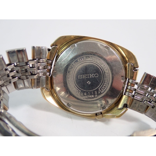 478 - A gold plated cushion cased Seiko Five automatic wristwatch on bracelet