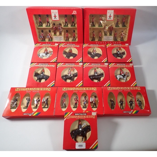 490 - A box of fourteen Britains metal models including Scots Guard Band and Piper Band for Hamleys plus 7... 