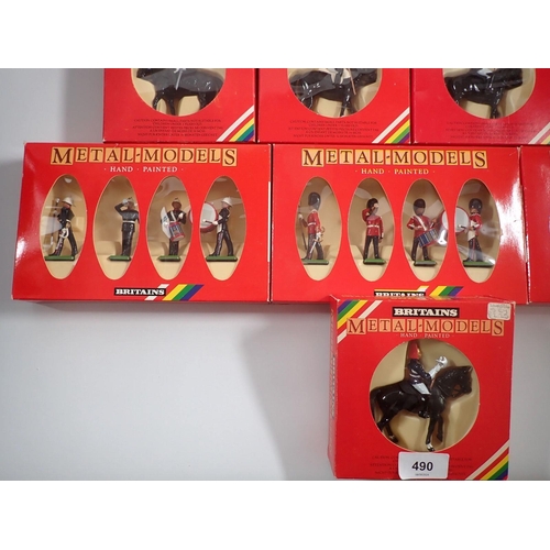 490 - A box of fourteen Britains metal models including Scots Guard Band and Piper Band for Hamleys plus 7... 