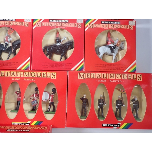 490 - A box of fourteen Britains metal models including Scots Guard Band and Piper Band for Hamleys plus 7... 