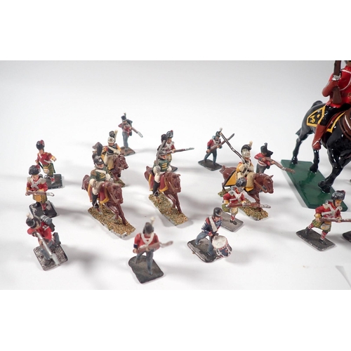 499 - A Royal Canadian Mounted Police (RCMP) metal painted figure on horseback, 10cm tall plus a selection... 