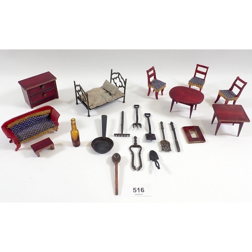 516 - A group of Victorian and later dolls house furniture including cast iron bed, garden tools etc.