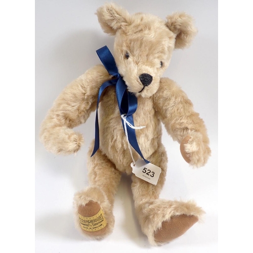 523 - A 1990's limited edition Merrythought teddy bear No 0277 of 1000, 30cm tall