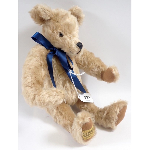 523 - A 1990's limited edition Merrythought teddy bear No 0277 of 1000, 30cm tall