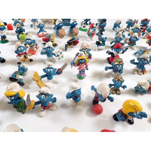 541 - A collection of 65 Peyo/Schleich Smurfs