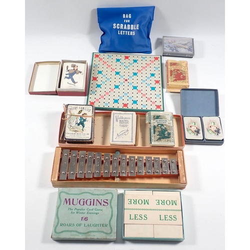 553 - A collection of playing cards, a xylophone and vintage travel scrabble