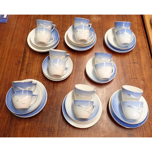 56 - A matched Copenhagen set of sixteen cups and saucers plus twelve tea plates (some with gold rims)