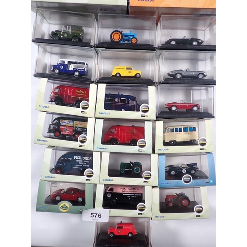 576 - A group of Oxford diecast vehicles incluidng railway scale, commercials, showtime, roadshow and fire... 