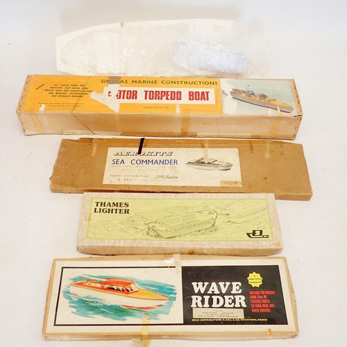 584 - A group of model boat kits including Aerokits Sea Commander, Wave Rider, Duplex Thames Lighter and a... 