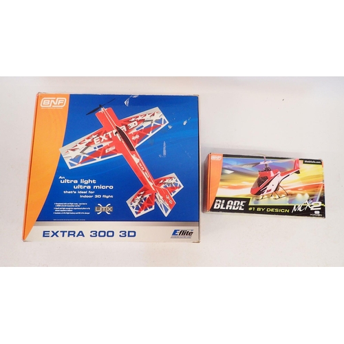 591 - A BNF Extra 300 3D remote control aeroplane - boxed with no charger or remote plus a Blade MCX2 remo... 