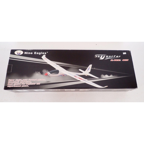 595 - A Nine Eagles Skysurfer remote control aeroplane - boxed, wingspan 78cm