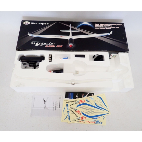 595 - A Nine Eagles Skysurfer remote control aeroplane - boxed, wingspan 78cm