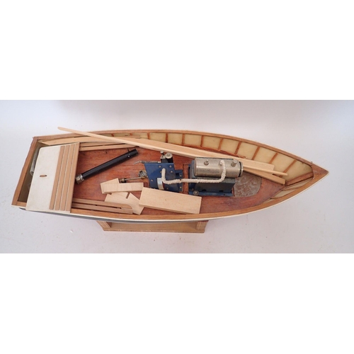 598 - An Oyster Catcher steam powered model boat, part built on stand, 77cm long