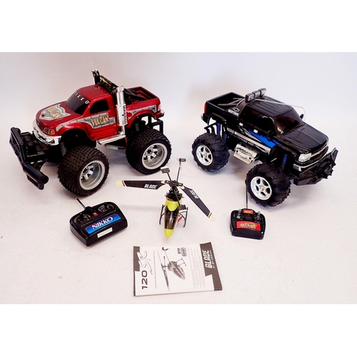 603 - A Nikko Ford F150 Vulcan remote control truck with battery pack, charger and remote, A Fastlane Chev... 