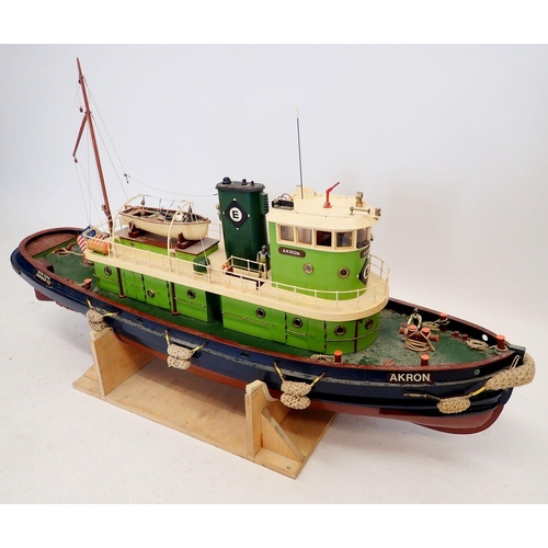 607 - A remote control model of the Akron tug boat, New York Harbour Co USA on stand, no remote, approx 96... 