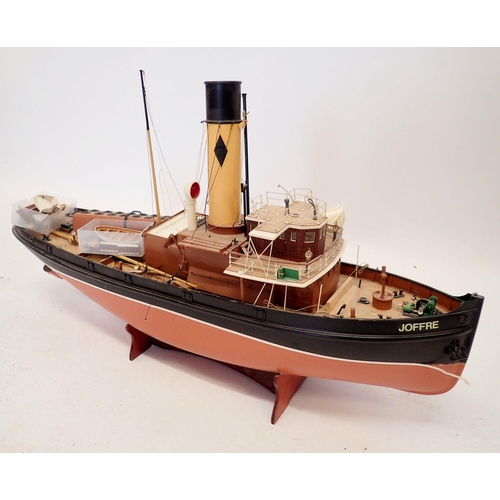 608 - A Jaffre steam tug boat fibreglass model on stand, part built, approx 76cm long