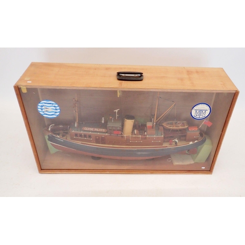 609 - A Clyde Pilots No 1 Cumbrae remote control model boat in a wooden and perspex fronted display case -... 