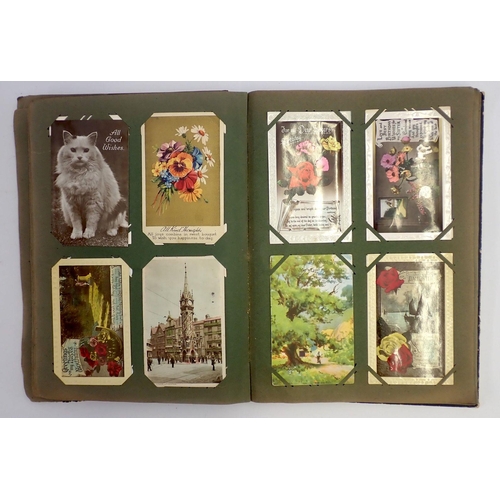 623 - An old postcard album of mainly greetings cards plus a few postcards, approximately 250