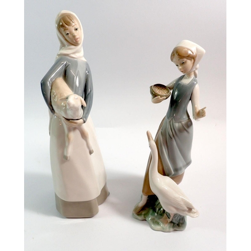 63 - Two Lladro figures including girl with lamp, 27.5cm tall and girl feeding a goose, 24cm tall