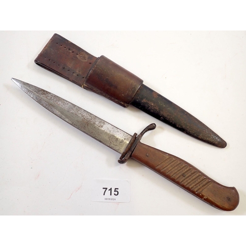 715 - A wooden handled hunting knife with leather and steel frog, 28cm