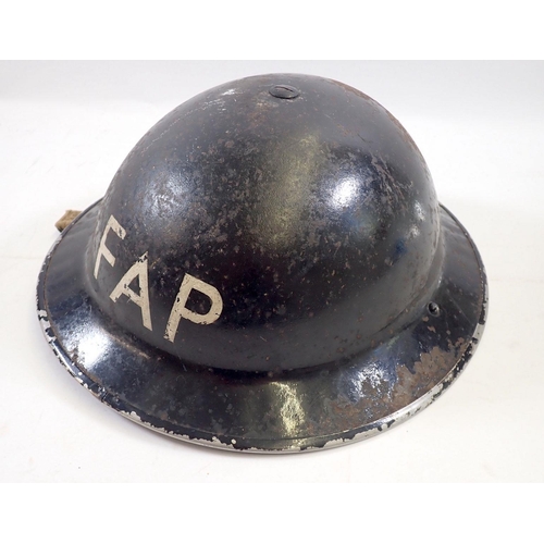 716 - A WWII First Aid Post military helmet marked FAP, dated 1939, by EC Co. Ltd