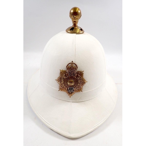 718 - A Royal Marine pith helmet