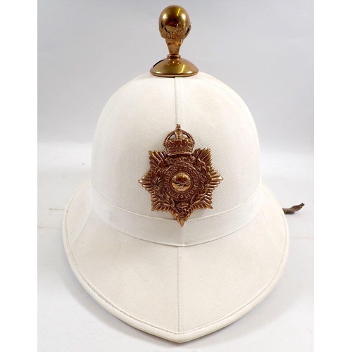 719 - A Royal Marine pith helmet