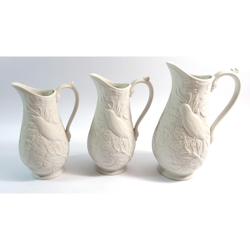 72 - A Portmeirion set of three bisque graduated Nightingale jugs, tallest 25cm