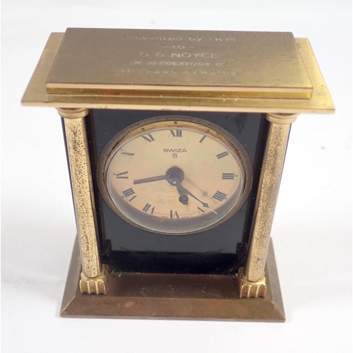 756 - A Swiza eight day gilt metal alarm clock plus two Smiths examples (3)