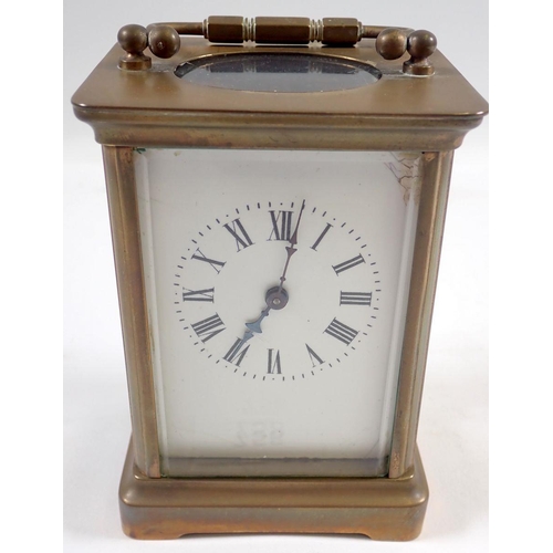 758 - A French brass eight day carriage clock with key