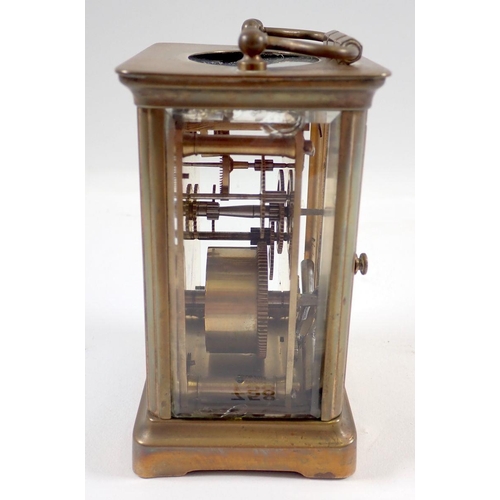 758 - A French brass eight day carriage clock with key