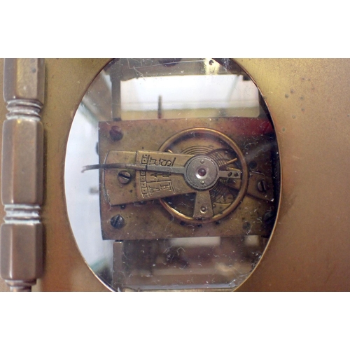 758 - A French brass eight day carriage clock with key