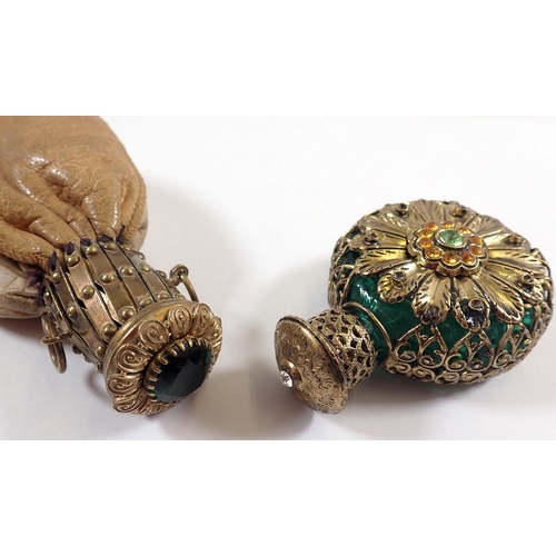 762 - A leather misers purse with gilt metal and green stone hinged lid and a gilt metal mounted scent bot... 