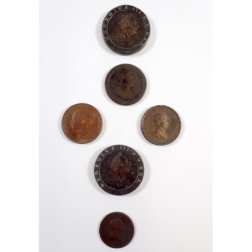 780 - A British group of copper coins including two George III cartwheel twopences and a cartwheel penny 1... 