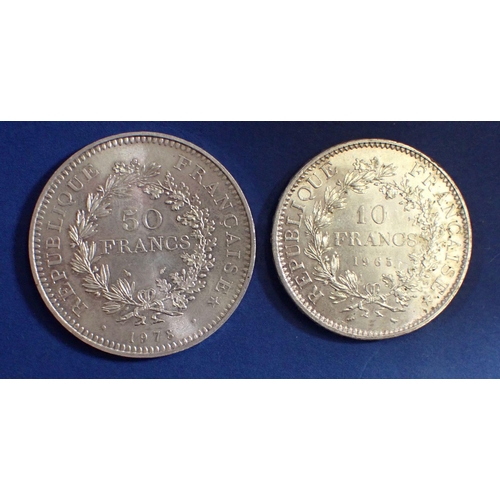 786 - A 1978 French 50 francs 'Hercules' 900 silver and 1965 10 francs 900 silver coin plus a miscellaneou... 