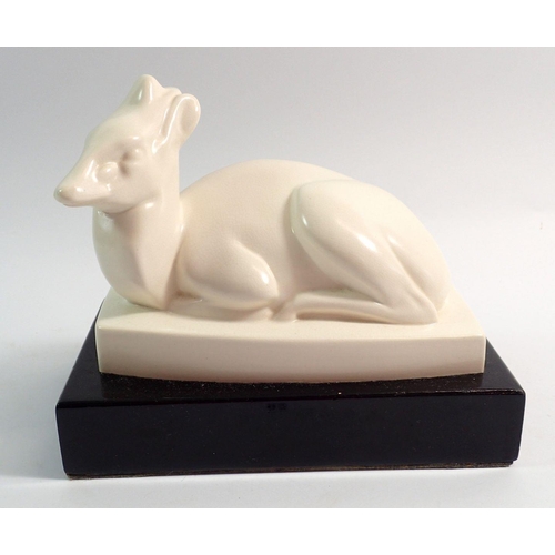 82 - A Wedgwood figure of seated deer by John Skeaping, mounted on a plinth