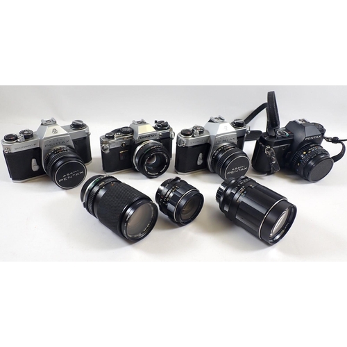 824 - A group of cameras including two Asahi Pentax Spotmatic F, a P30 and an Olympus OM10 with various le... 