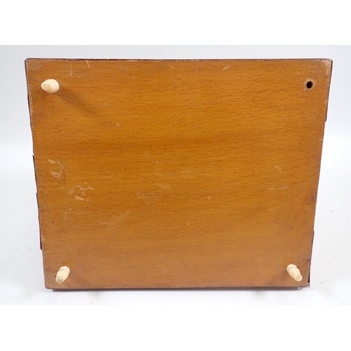 832 - A novelty inlaid bone and coloured wood cigarette box, 19cm wide