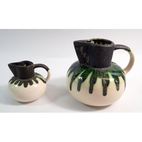 84 - Two Beddgelert Welsh pottery jugs - largest 13.5cm tall