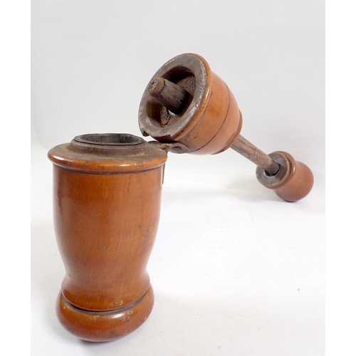 848 - An antique treen wine corker, 21cm